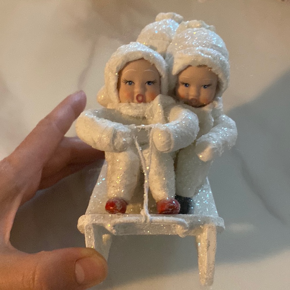 Children on a sled holiday ornament